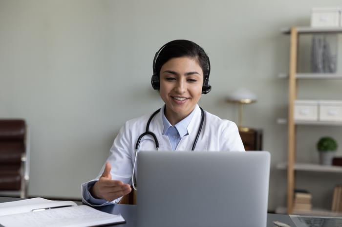 doctor at her desk