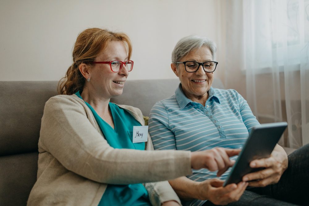 Senior woman visited by home care specialist